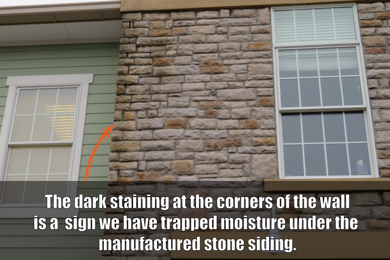 dark staining on manufactured stone means water problems