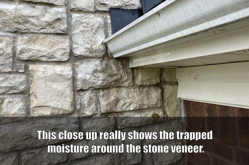 Stone Veneer stained from trapped moisture